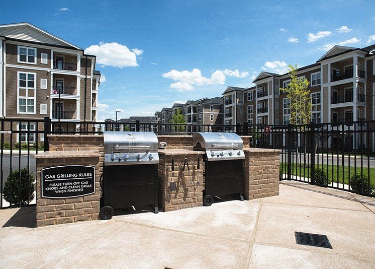 Outdoor Space Grilling Kitchen at Abberly at Southpoint Apartment Homes by HHHunt, Fredericksburg, VA